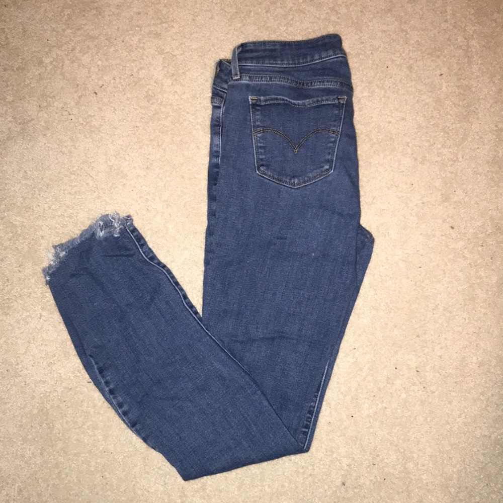 Levi’s mid-rise 711 Skinny (tall) with Distressing
